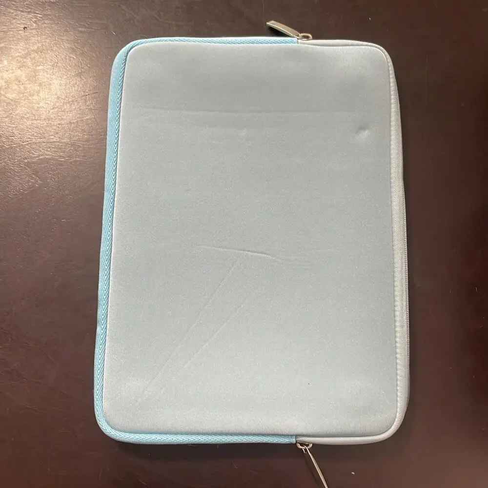 MacBook New Pro 13” shell and light blue soft case